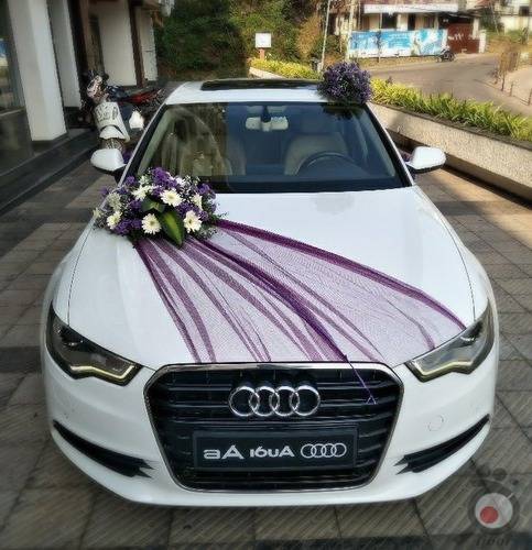 تزئین ماشین عروس با تور و گل