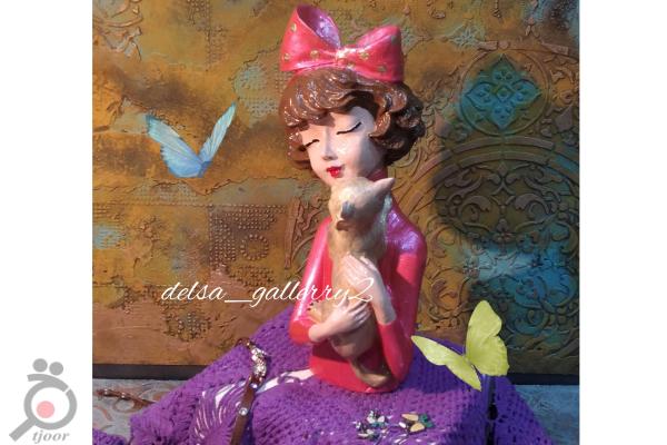 مجسمه نیلا گربه به دست